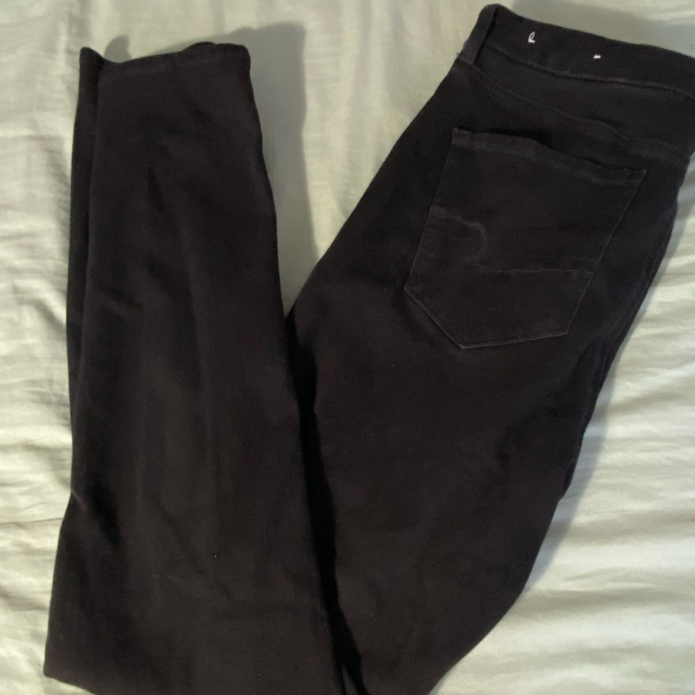 Black super high rise skinny jeans